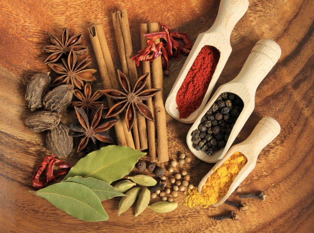Cooking ingredients - warm colours of herbs and spices.